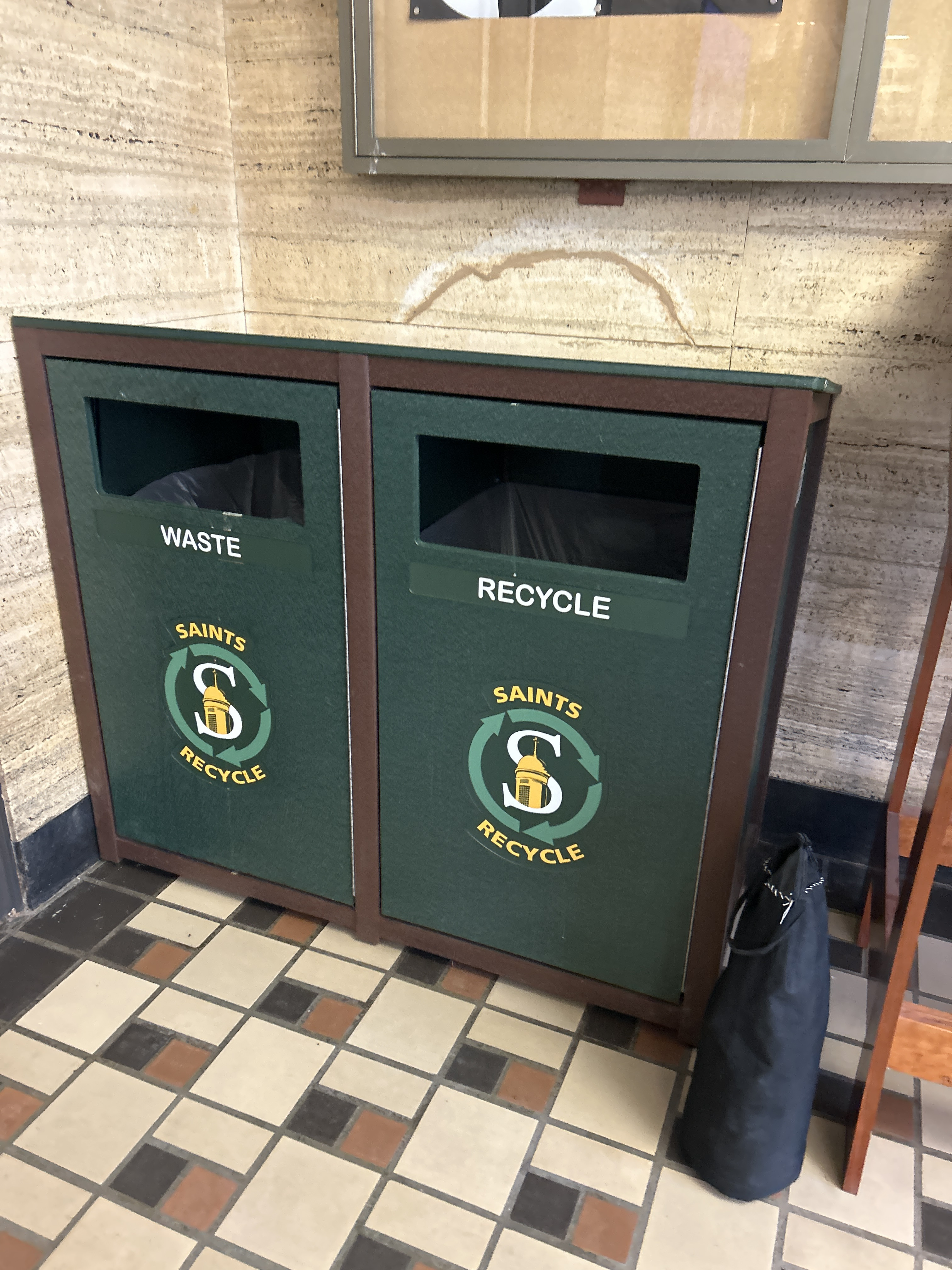 Two sided recycling bins and garbage often found on Siena's campus