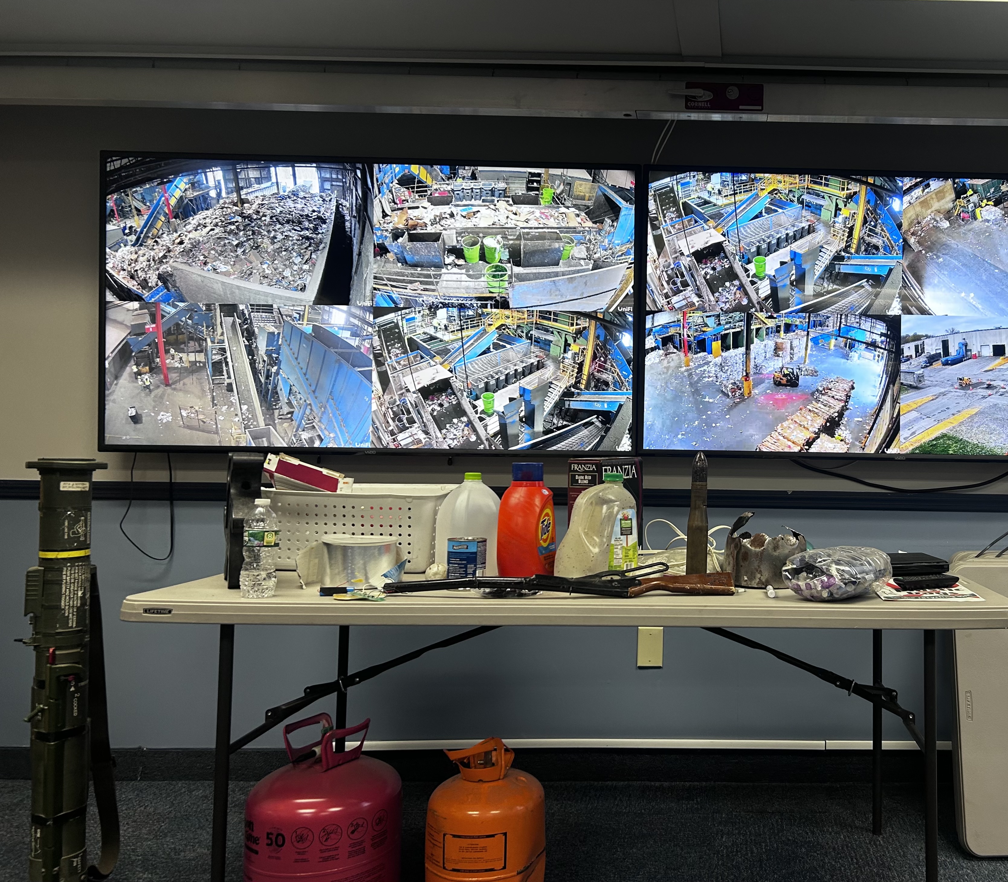 Image of contaminants found in recycling plant, including some weapons
