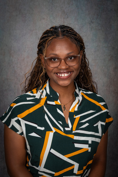 Headshot of christian representative Aretha