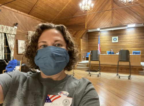 Amy working at polling center