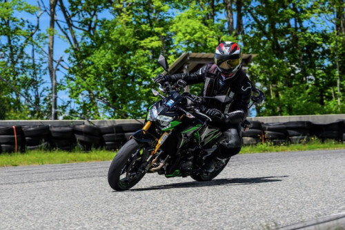 Cooper on a motorcycle
