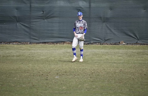 Tim playing baseball