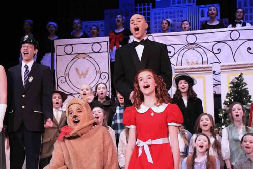 Emily starring in Annie