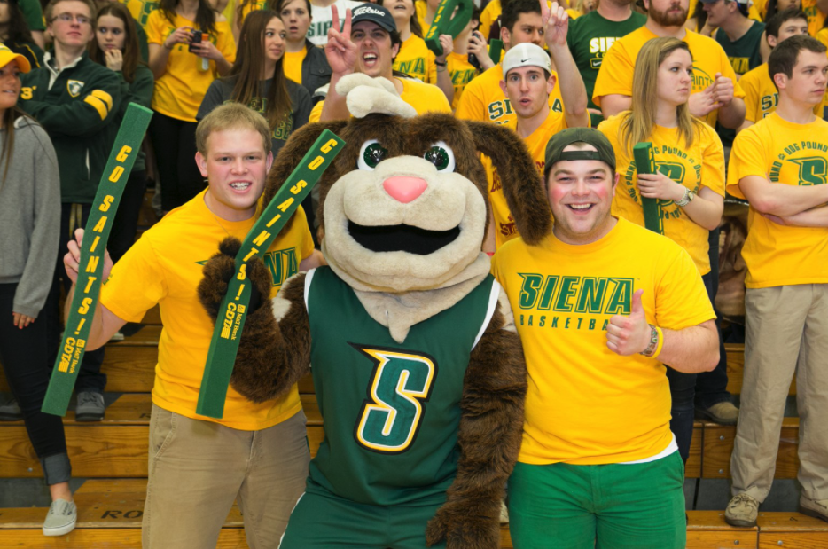 Bernie the Siena College Mascot celebrates with fans